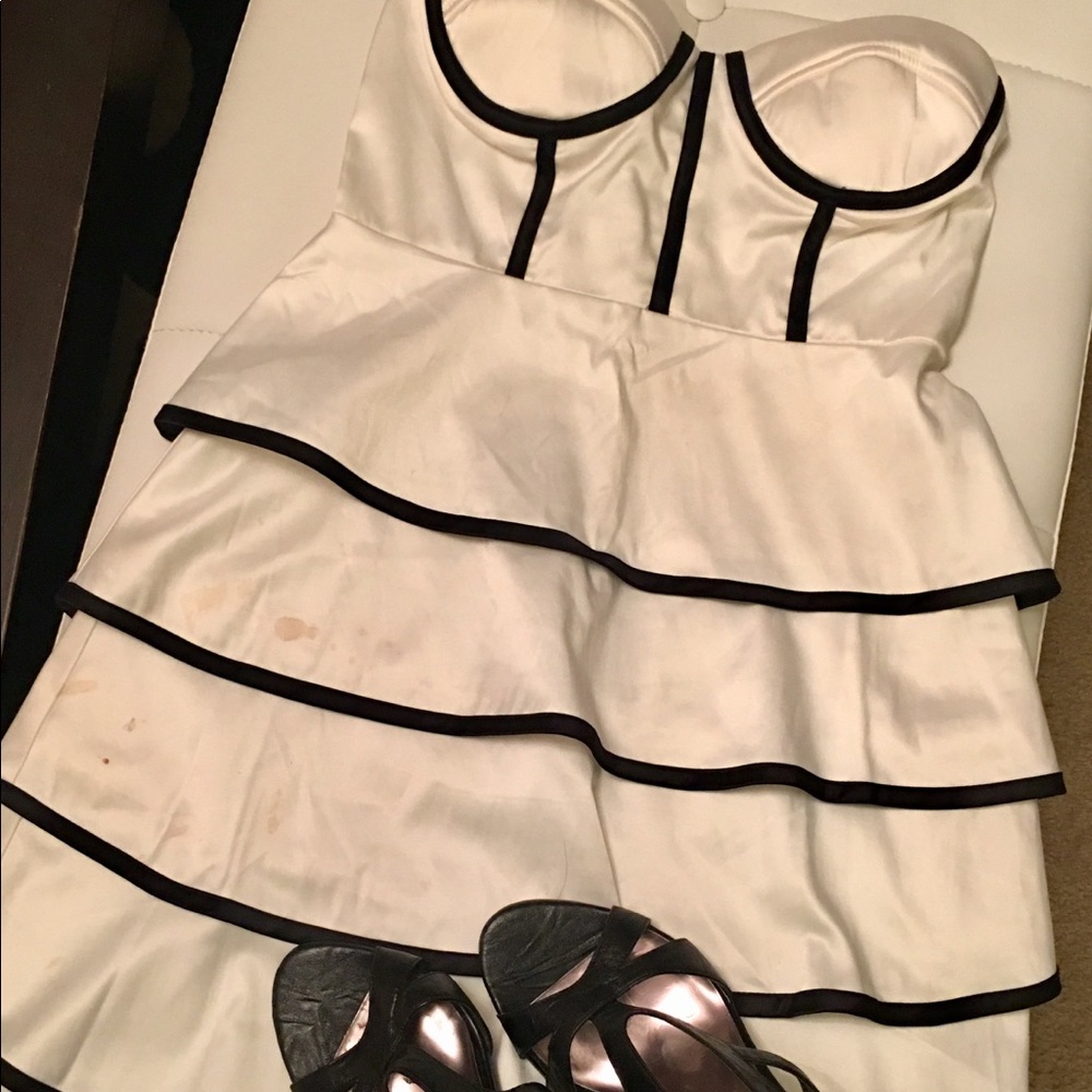 White tiered bodice dress with black trim
